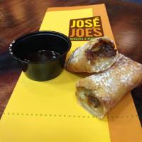 Cookie Dough Burrito · A fried mini burrito stuffed with cookie dough and dusted with powdered sugar. Served with a...