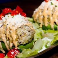 Stuffed Avocado · Ripe avocado, stuffed with quinoa and wild rice, topeed with red peppers, salsa roja, queso ...