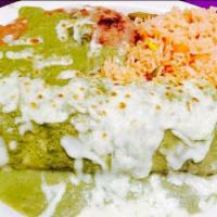 Burrito Verde · Chicken breast shredded in green mole sauce. Served with Mexican rice, refried beans and mel...