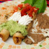 Flautas Chilangas · Two flour tortillas stuffed with shredded chicken or shredded beef with pico de gallo, sour ...