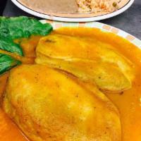 Chiles Rellenos · Poblano peppers stuffed with fresh Mexican cheese and tomato sauce on top, served with rice ...