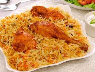 Chicken Biryani with Bones · Succulent pieces of chicken and long grain rice cooked in a sealed pot with a mild blend of spices.
