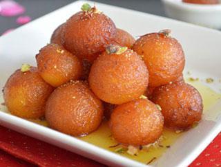 Gulab Jamun · Fried milk balls, sugar syrup.