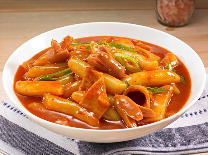 Ddok-Bokki · Stir-fried rice cakes with Korean hot source and fishcake. Add noodles at extra charge. Spicy.