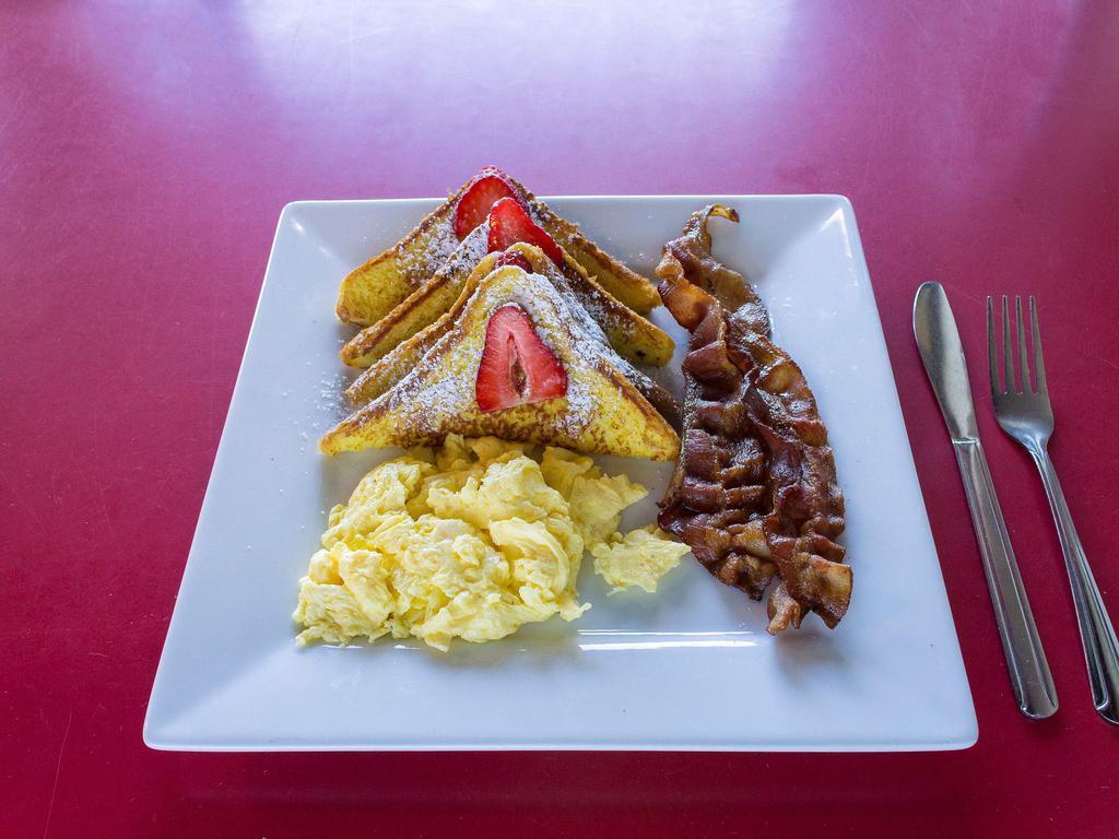 French Toast Combo · Served with two slices of French toast, one egg, and three strips of bacon or sausage links.