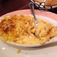 Baked Macaroni and Cheese · Classic style macaroni and cheese with American, cheddar and Parmesan cheeses.
