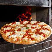 Traditional Pizza · Our classic pizza with secret recipe tomato sauce, hand-sliced mozzarella and basil. Topped ...