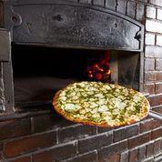 Pesto Pizza · Hand sliced mozzarella and basil pesto sauce drizzle. Topped with our signature cheese and s...