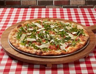 Prosciutto Arugula Pizza · Our classic white pizza topped with thinly sliced prosciutto, shaved cheese blend and fresh arugula.