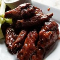 Habanero Honey BBQ Wings · Tossed in a sweet and spicy sauce.