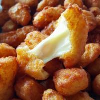 Cheese Curds · Served with marinara.