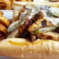 Chicken Philly · Onions, peppers, pepper jack cheese, chipotle mayo, and fries.