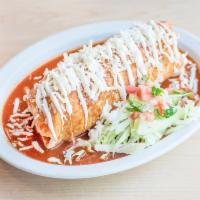 Burrito Mojado · Your choice of meat, rice, beans, pico de gallo sour cream, cheese and avocado wrapped with ...