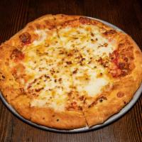 Quattro Formaggio Pizza · Parmesan, fresh mozzarella, mozzarella, feta and garlic.