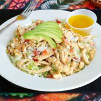 Mexican Salad with Chicken · Iceberg lettuce, fresh cheese, avocado, corn, onions, cilantro, tomatoes, cucumbers, olive o...