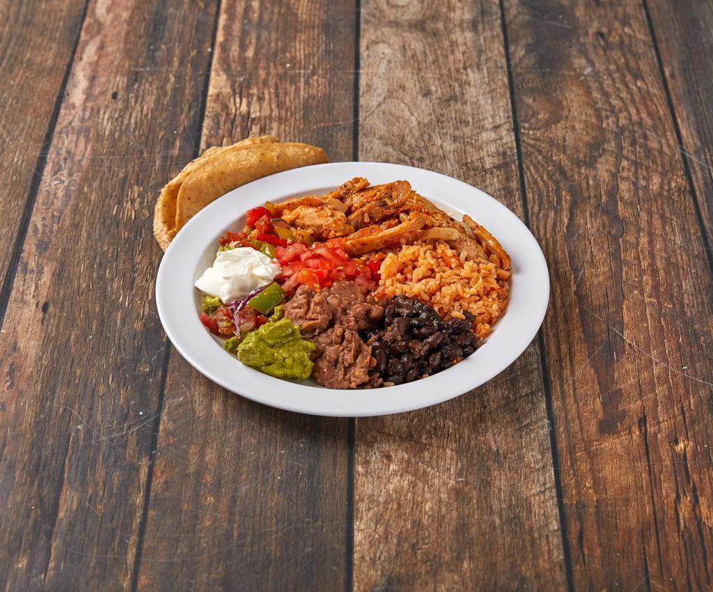 Chicken Fajitas · Chicken fajitas with 3 corn or flour tortillas, guacamole, and sour cream.  Served with rice, beans, and salad.