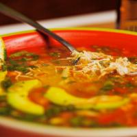 House Soup · Chicken, rice, pico de gallo and avocado in a rich garlicky chicken broth and served with to...