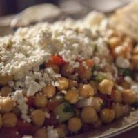 Revithosalata · Chickpea salad. Chopped tomato, cucumber, red onions, red peppers and crumbled feta.