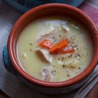 Avgolemono Soup · Egg and lemon chicken soup with carrot and celery.