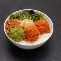Spicy Tuna Bowl · Spicy tuna, mixed greens, fried onion, onion dressing, and guacamole over rice.