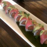 Spicy Tataki Roll · Spicy tuna and cucumber roll topped with seared tuna and avocado, then drizzled with ponzu a...