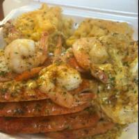 Snow Crab and Shrimp Dinner · Served with crab rice and 2 sides.