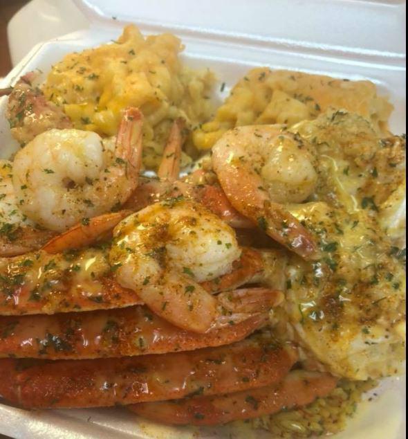 Snow Crab and Shrimp Dinner · Served with crab rice and 2 sides.