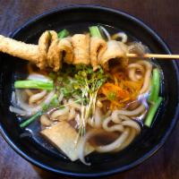 Udon · Udon noodle with fishcake, onion, green onion, pickle radish, and seaweed in soy broth.