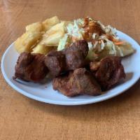 Yuca con Chicharron · fried cassava, pork morsels, curtido, salsa