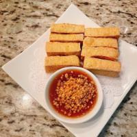 Fried Tofu · Fried bean curd cakes served with plum sauce and ground peanuts