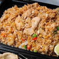 Thai Fried Rice · Fried rice with egg, peas, carrots, onions, and your choice of protein.