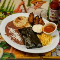 Anita’s Favorite Combo · 1 chicken tamale and 1 pupusa any filling. Served with cabbage salad, salsa, refried beans, ...