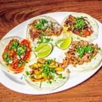 Tacos · Your choice of carnitas, al pastor, chicken, asada, barbacoa, chorizo, cabeza, or lengua wit...