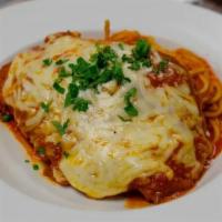 Chicken Parmesan · Tomato sauce, mozzarella, Parmesan, spaghetti.