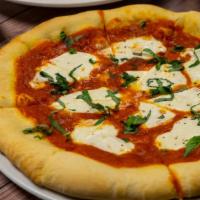 Fresh Mozzarella Pizza · Red sauce, basil, olio verde.