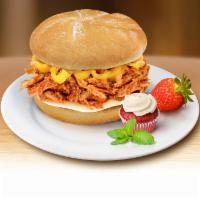 BBQ Pork Sandwich · Slow roasted pork tenderloin, provolone cheese, romaine lettuce, red onion, tomato, pepperon...