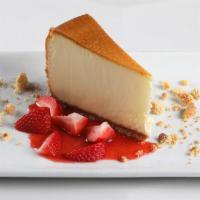 NEW YORK STYLE CHEESECAKE · shortbread crust, decadent cheesecake, fresh strawberries