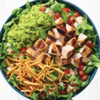 Grilled Chicken Salad · Grilled all-natural chicken, crisp romaine lettuce, guacamole, salsa fresca, topped with chi...