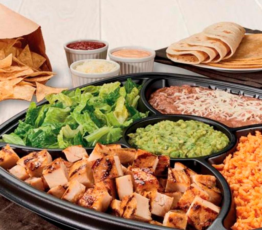 Family Taco Kit · Choice of all-natural grilled chicken, USDA Choice Steak or grilled shrimp, choice of pinto beans or black beans, choice of citrus rice or Mexican rice, guacamole, romaine, three cheese blend, chipotle sauce, mild salsa, a mix of 8 corn and flour tortillas and tortilla chips. Serves4-5.