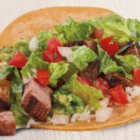 Classic Two Taco Plate with All Natural Steak · Two Tacos made with fresh guacamole, cheese, salsa fresca, lettuce and chipotle sauce. Serve...