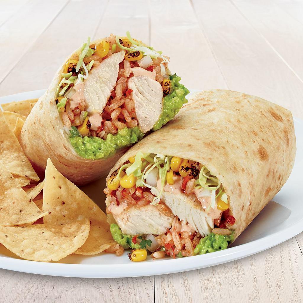 Wild Mahi Mahi Burrito · Fresh guacamole, fire-roasted corn, Mexican rice, creamy chipotle sauce, cilantro, onion and cabbage. Served on a flour tortilla with chips.