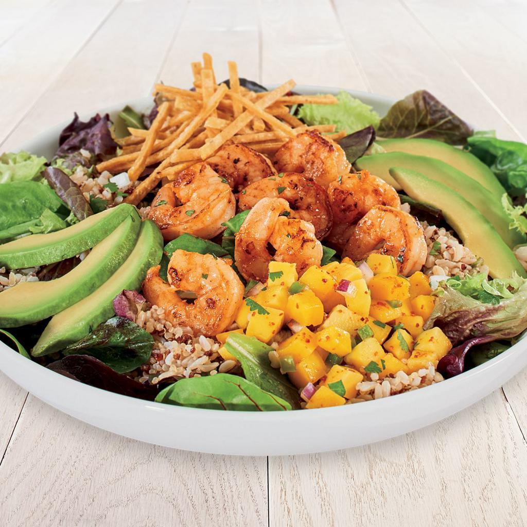 Mango Avocado Quinoa Salad · Served with your choice of all-natural chicken or steak, grilled seafood, or grilled veggies with mango salsa, brown rice and quinoa, avocado, tortilla strips, fresh mixed greens and lemon agave white balsamic vinaigrette.