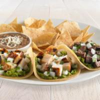 Rubio's Street Taco · All natural chicken or all natural steak. On street-sized tortillas with fresh guacamole and...
