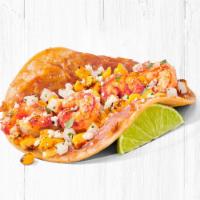 Mexican Street Corn Shrimp Taco · Grilled shrimp and Mexican street corn topped with cotija cheese, chipotle sauce, cilantro/o...
