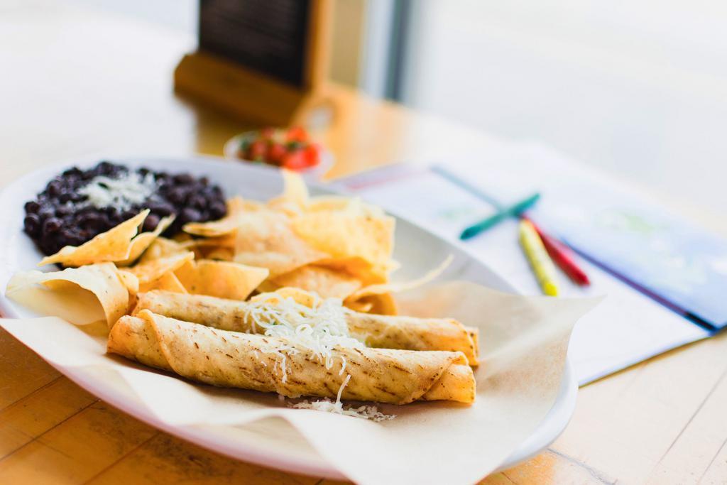 Kid's Chicken Taquitos · All natural chicken rolled in crispy corn tortillas and topped with shredded cheese. Served with a choice of two sides and a drink. Our chicken is all natural and raised without antibiotics.