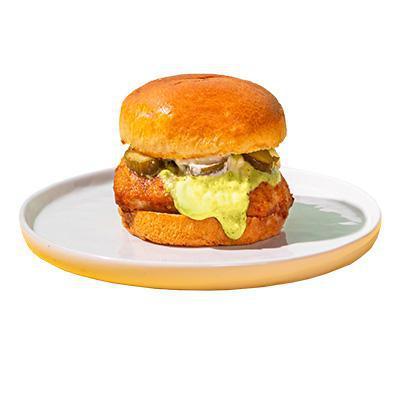 *New* Spicy Chicken Sandwich · Crispy Chicken Breast, Mayo, two Pickles placed on a Brioche Bun topped with everyone's favorite Special Green Sauce! 
