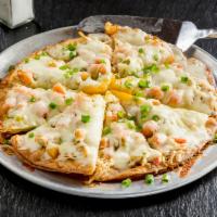 Pizza Nortena · Crisp tortilla with layers of seasoned chicken, our zesty cream cheese, fresh tomatoes, melt...