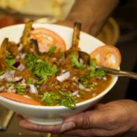 Mughlai Lamb Chops · Lamb chops in a yogurt tomato gravy with saffron.