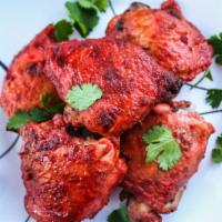 Tandoori Chicken- Half  · Chicken marinated in yogurt/spices.