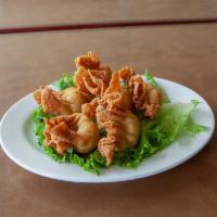 A2. Crab Puff · 6 pieces. Cream cheese, celery, breadcrumb, sweet and sour sauce.